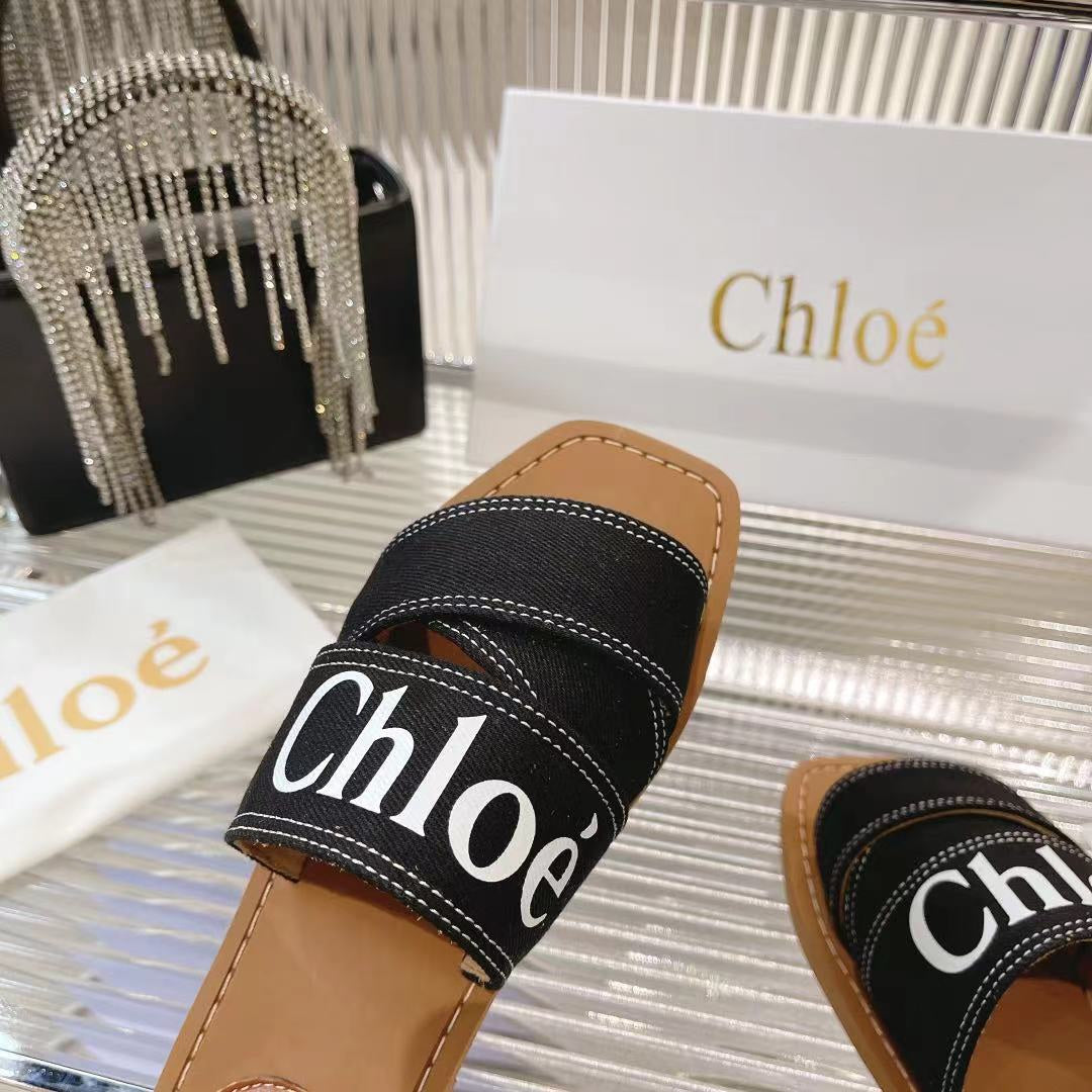 CHLOÉ WOODY MULE IN BLACK DENIM WITH WHITE LOGO