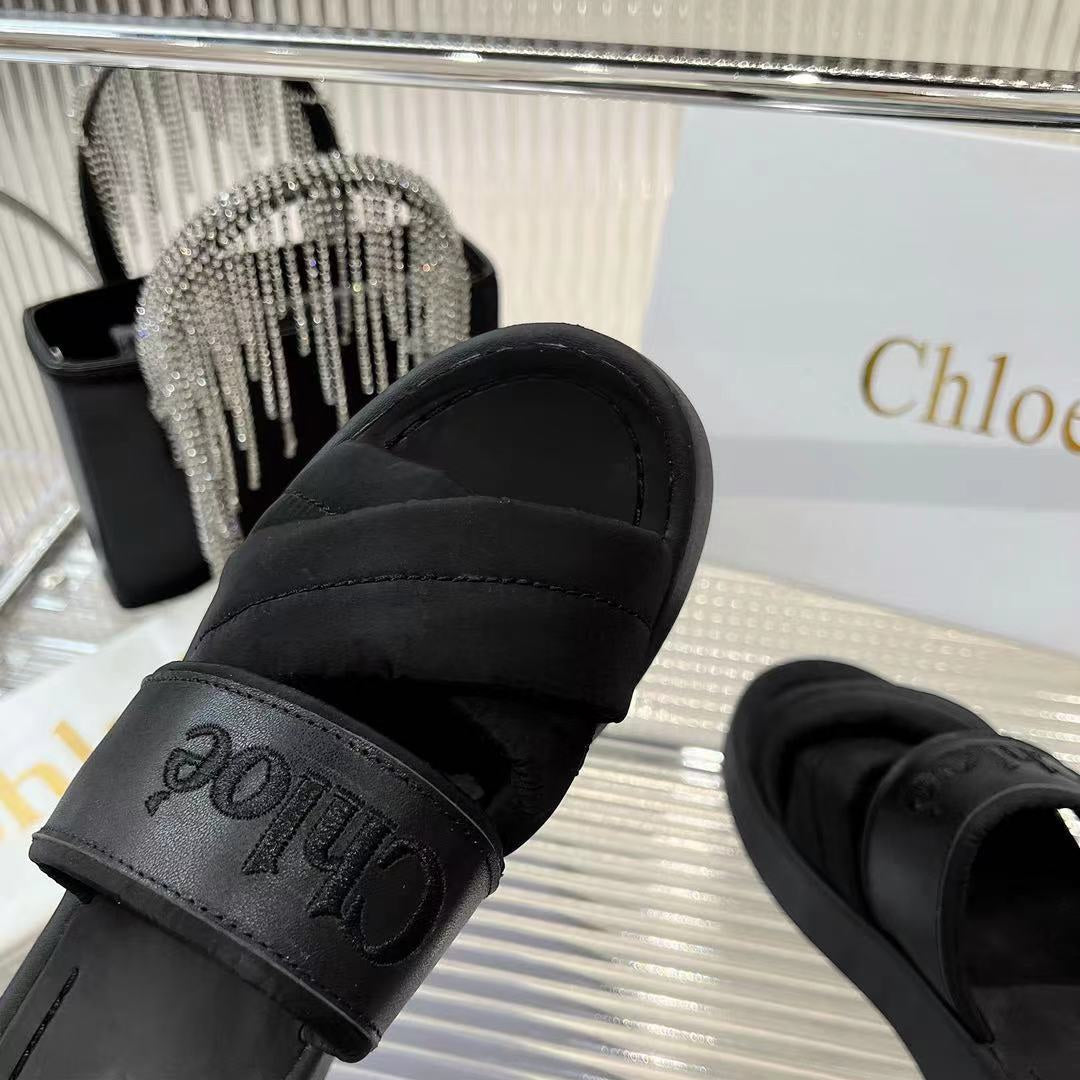CHLOÉ MILA FLAT SLIDES 5 CM IN BLACK CALFSKIN AND RE-NYLON