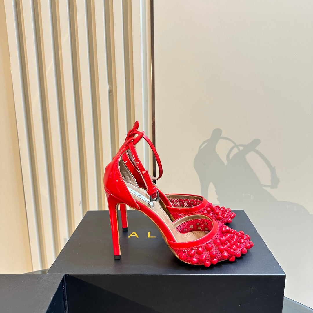ALAIA HIGH FISHNET PUMPS WITH STUDS IN CHERRY RED LYCRA MESH AND LAMBSKIN