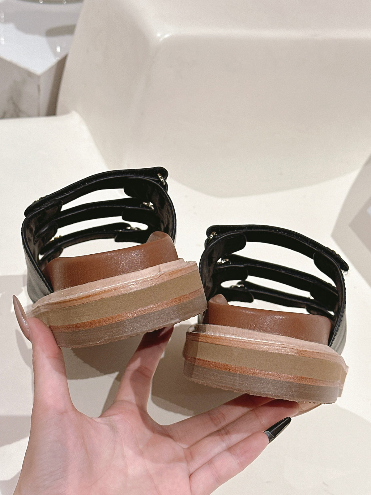 TRIOMPHE SANDALS IN BLACK CALFSKIN