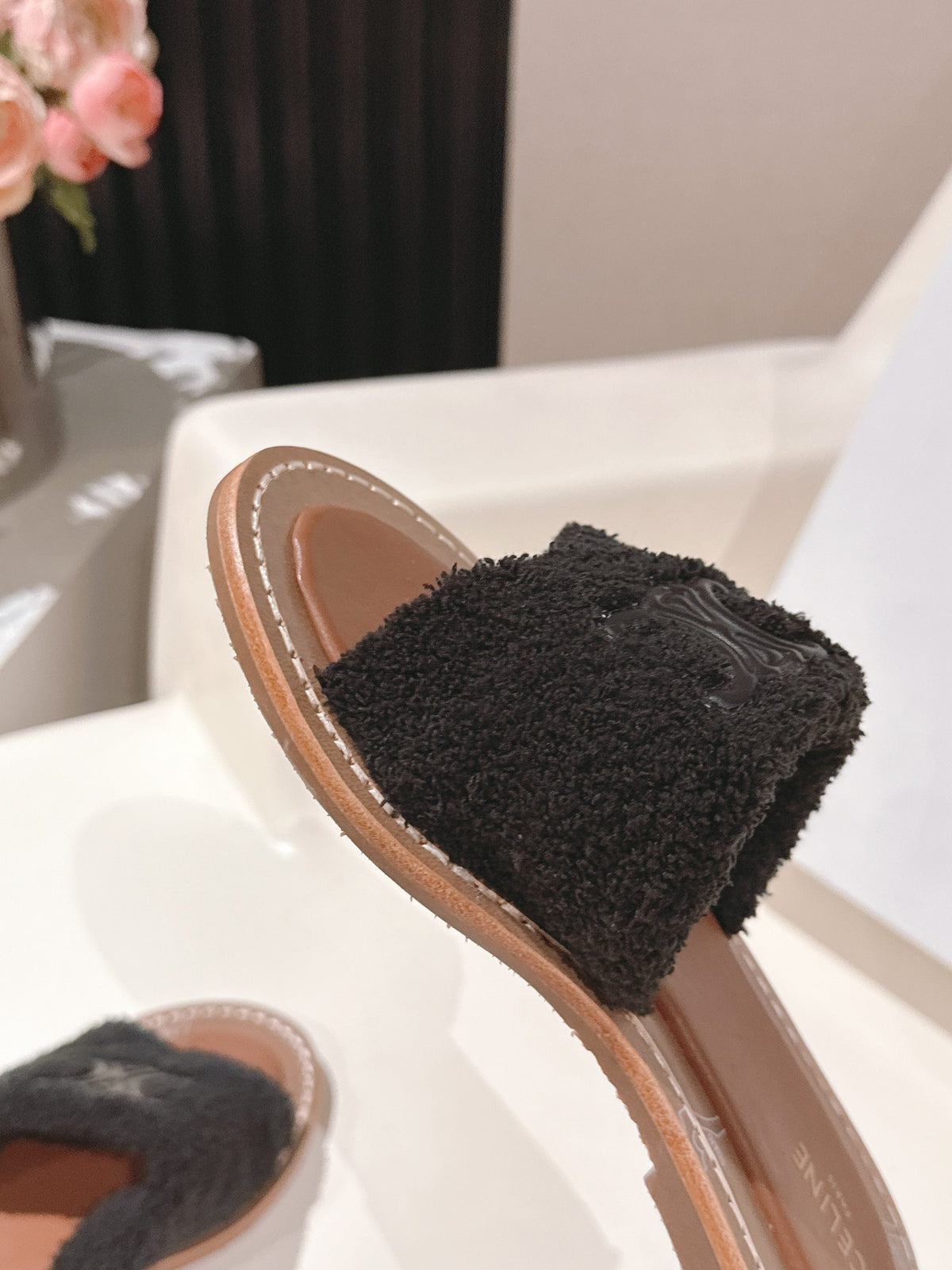 CELINE 25S LYMPIA TWISTED SANDAL IN BLACK SPONGE FABRIC