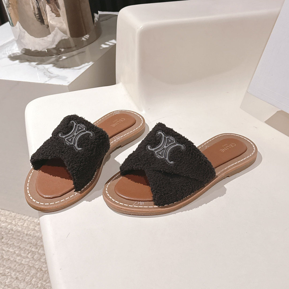 CELINE 25S LYMPIA TWISTED SANDAL IN BLACK SPONGE FABRIC