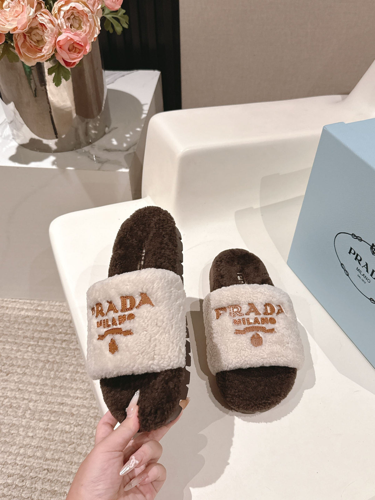 PRADA 25S FLAT MULES IN WHITE AND DARK BROWN RABBIT FUR
