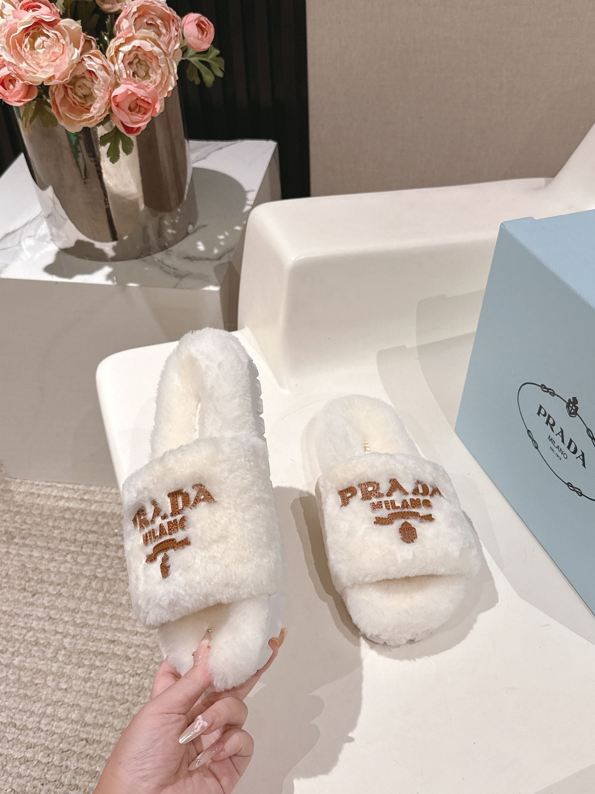 PRADA 25S FLAT MULES IN WHITE RABBIT FUR