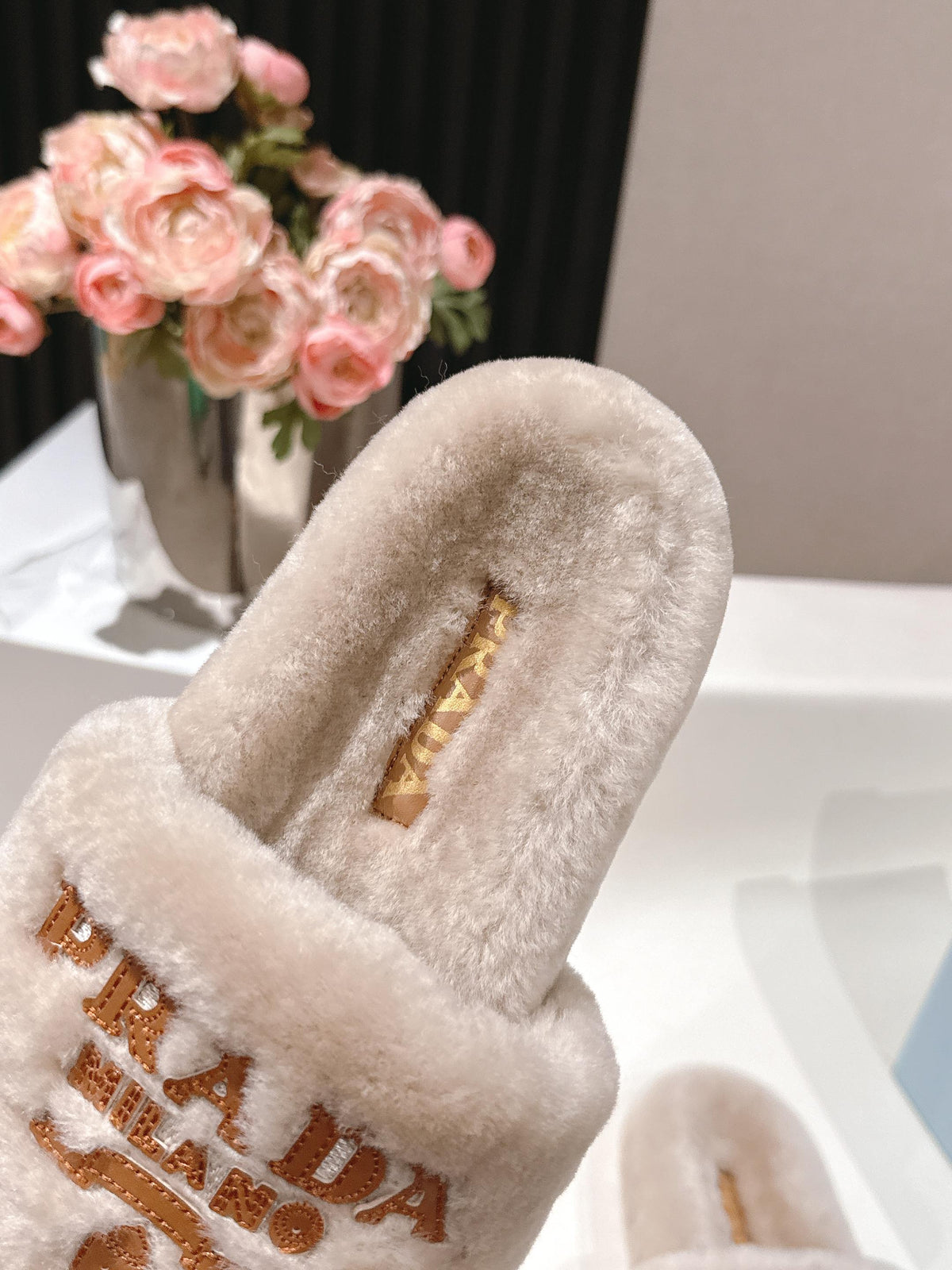 PRADA 25S FLAT MULES IN WARM TAUPE RABBIT FUR