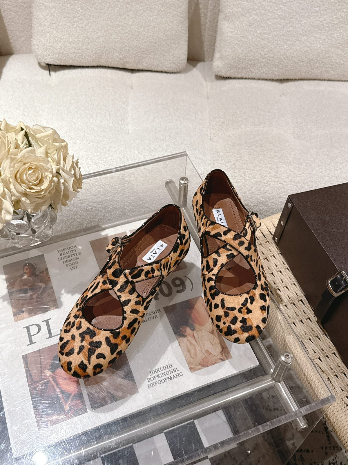 ALAIA 25S CRISS CROSS BALLET FLATS IN LEOPARD SUEDE