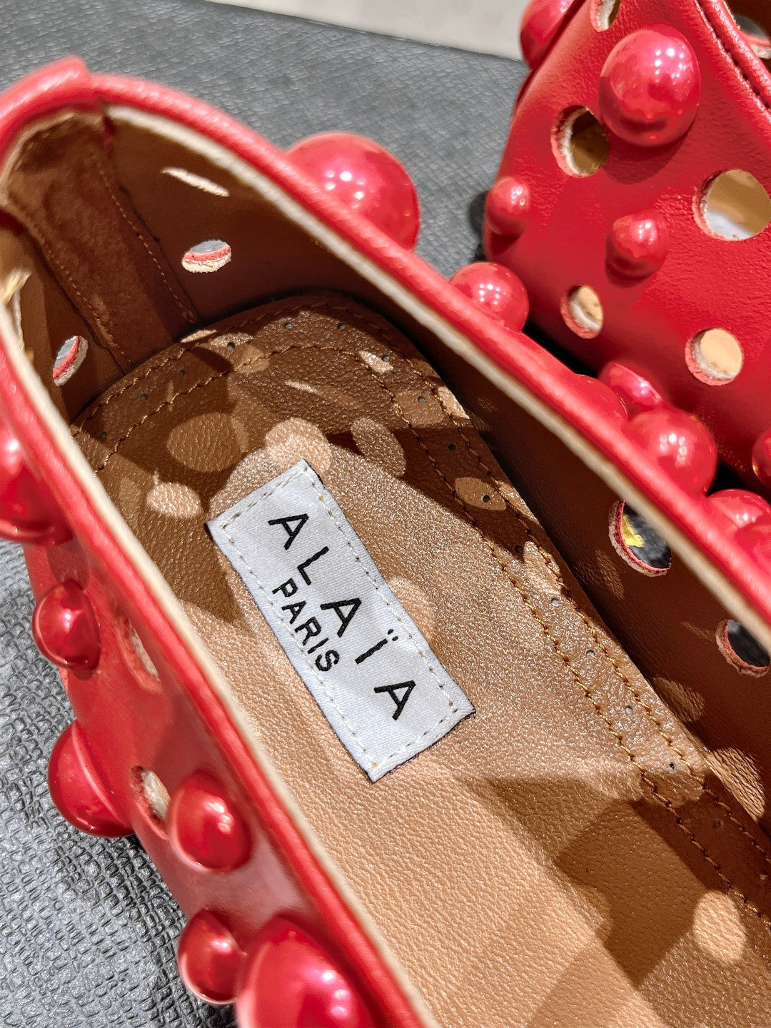 ALAIA PEARL MARY JANE SHOES IN ROSE RED LAMBSKIN
