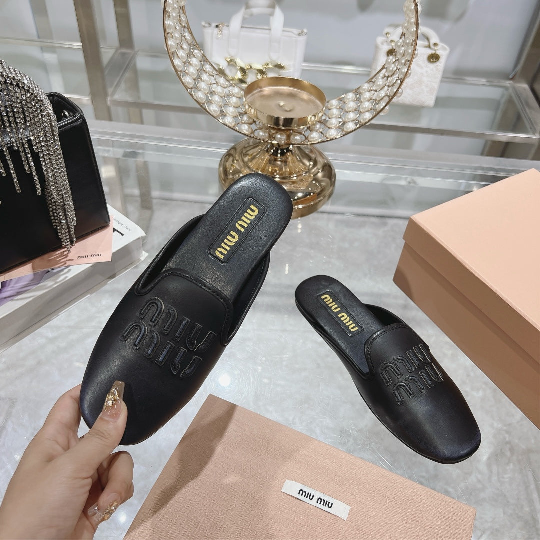 MULES SLIPPERS BLACK COWHIDE